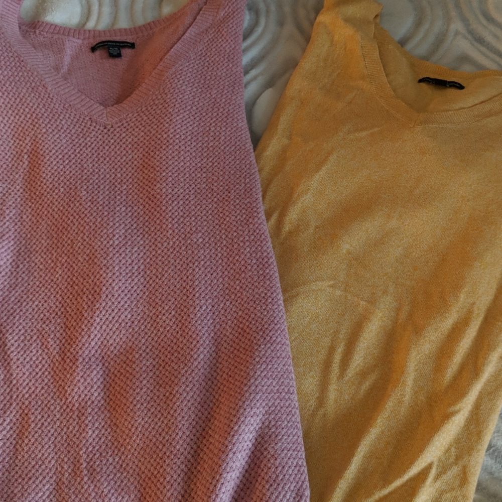 Two long sleeved sweaters